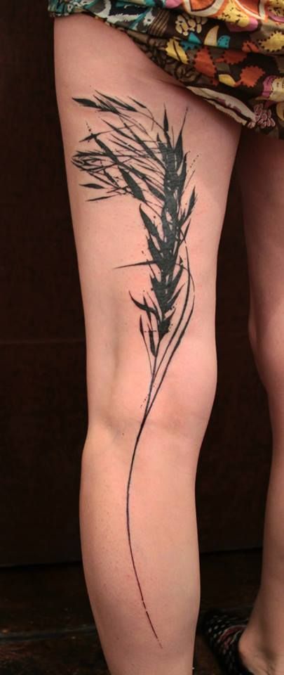 Artistic leg tattoo