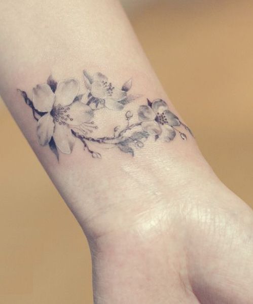 White flowers tattoo